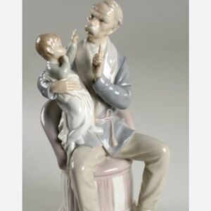 Lladro figurine grandfather with child
